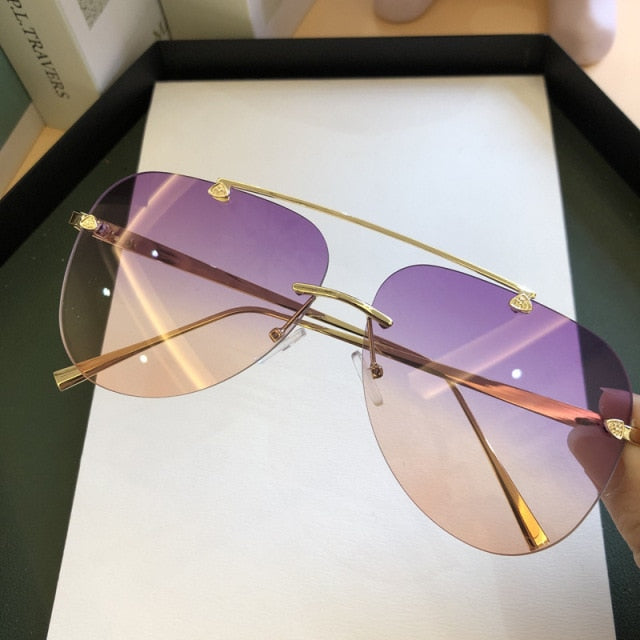 2021 Luxury Designer Fashion Oval Rimless SunglassesSummer Glasses Fas –  Malone Music Outlet